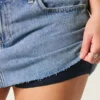 Curvy Low-Rise Medium Wash Denim Mini Skort Curvy Low-Rise Medium Wash Denim Mini Skort