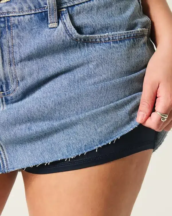 Curvy Low-Rise Medium Wash Denim Mini Skort Curvy Low-Rise Medium Wash Denim Mini Skort