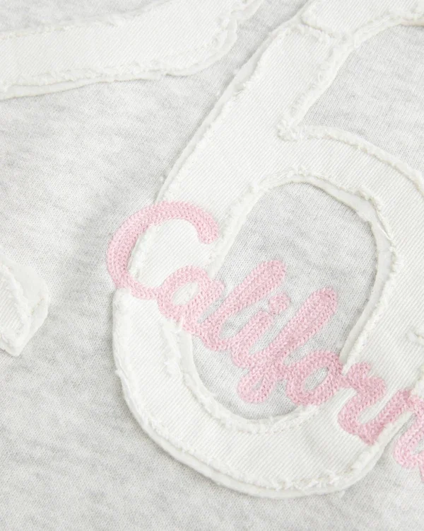 Faux Fur-Lined Hood Graphic Hoodie Faux Fur-Lined Hood Graphic Hoodie