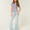High-Rise Ripped Light Wash Flare Jeans High-Rise Ripped Light Wash Flare Jeans