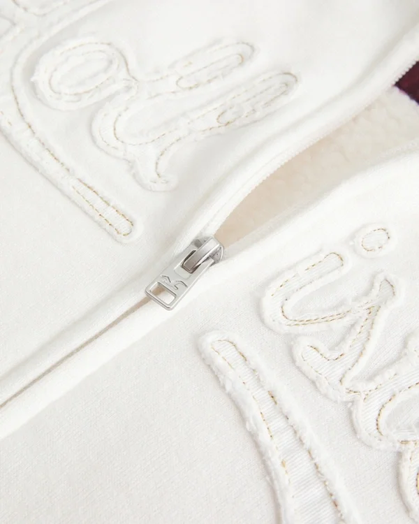 Holiday Vault Release Sherpa-Lined Zip-Up Logo Graphic Hoodie Holiday Vault Release Sherpa-Lined Zip-Up Logo Graphic Hoodie