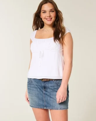 Low-Rise Embroidered Denim Mini Skort