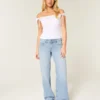 Low-Rise Light Wash Studded Bows Baggy Jeans Low-Rise Light Wash Studded Bows Baggy Jeans