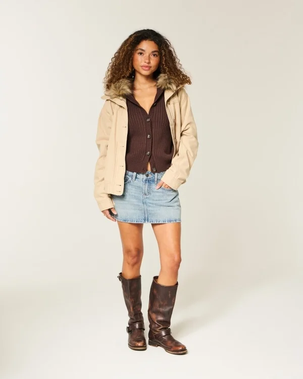 Low-Rise Medium Wash Studded Denim Mini Skort Low-Rise Medium Wash Studded Denim Mini Skort