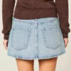 Low-Rise Medium Wash Studded Denim Mini Skort Low-Rise Medium Wash Studded Denim Mini Skort