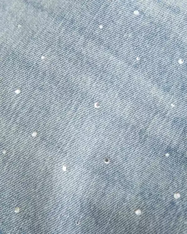 Low-Rise Medium Wash Studded Denim Mini Skort Low-Rise Medium Wash Studded Denim Mini Skort