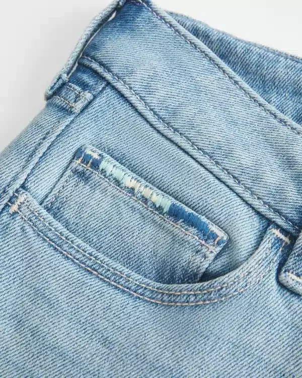 Low-Rise Ripped Light Wash Embroidered Bootcut Jeans Low-Rise Ripped Light Wash Embroidered Bootcut Jeans