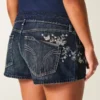 Ultra Low-Rise Dark Wash Butterfly Embroidered Denim Mini Shorts Ultra Low-Rise Dark Wash Butterfly Embroidered Denim Mini Shorts