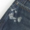 Ultra Low-Rise Dark Wash Butterfly Embroidered Denim Mini Shorts Ultra Low-Rise Dark Wash Butterfly Embroidered Denim Mini Shorts