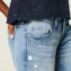 Ultra Low-Rise Distressed Light Wash Sequin Flare Jeans Ultra Low-Rise Distressed Light Wash Sequin Flare Jeans