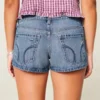Ultra Low-Rise Distressed Medium Wash Denim Mini Shorts Ultra Low-Rise Distressed Medium Wash Denim Mini Shorts
