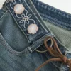 Ultra Low-Rise Embroidered Belt Medium Wash Flare Jeans Ultra Low-Rise Embroidered Belt Medium Wash Flare Jeans