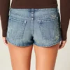 Ultra Low-Rise Medium Wash Floral Embroidered Denim Mini Shorts Ultra Low-Rise Medium Wash Floral Embroidered Denim Mini Shorts