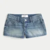 Ultra Low-Rise Medium Wash Floral Embroidered Denim Mini Shorts Ultra Low-Rise Medium Wash Floral Embroidered Denim Mini Shorts