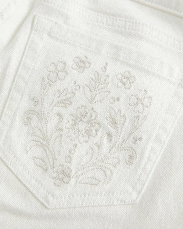 Ultra Low-Rise White Embroidered Pocket Flare Jeans Ultra Low-Rise White Embroidered Pocket Flare Jeans